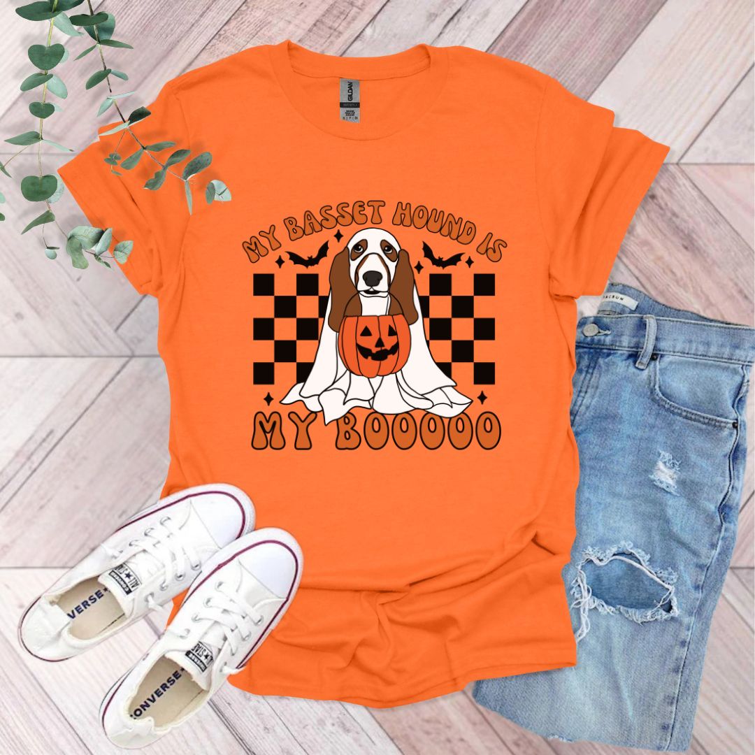 an orange shirt with a basset hound on it