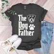 a t - shirt that says the dog father with a dog's paw on