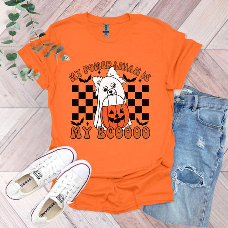 an orange shirt with a picture of a dog on it