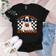 a black shirt with a white dog wearing a jack - o'- lantern pumpkin