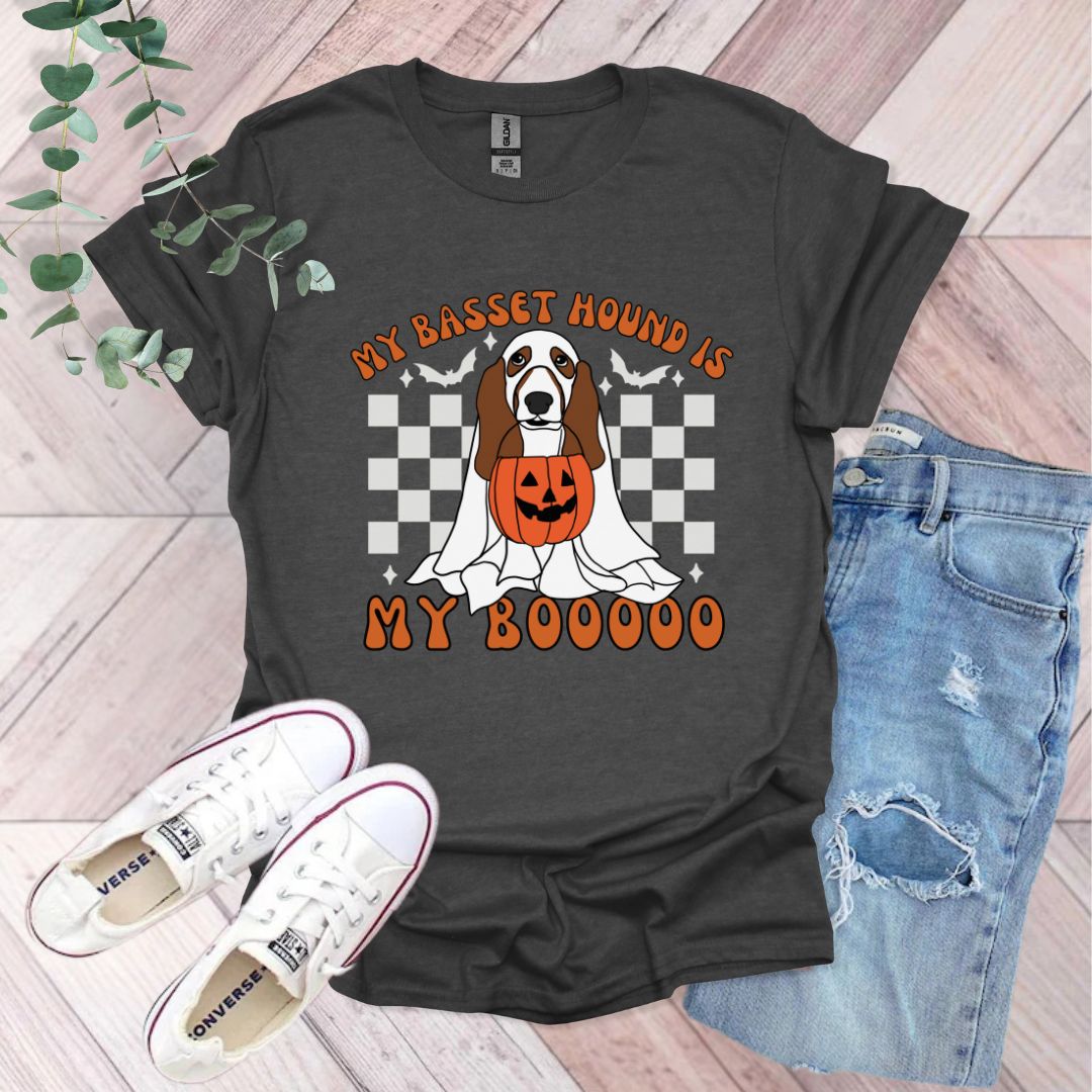 a black shirt with a brown and white dog on it