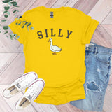 a yellow shirt that says silly with a duck on it