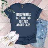 a t - shirt that says,'it's hard to talk about cats