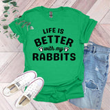 a green shirt that says life is better with my rabbits