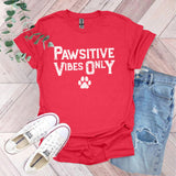 a red shirt that says pawstive vibes only with a paw print on it