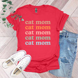 a t - shirt that says i'm a cat mom and a pair of