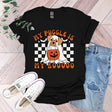 a black shirt with a dog wearing a pumpkin on it
