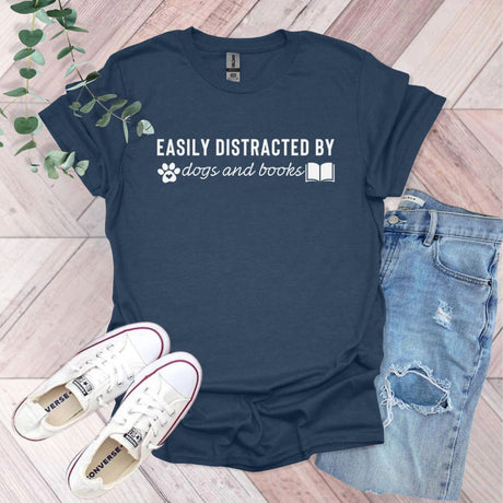 a t - shirt that says easily distracted by dogs and books