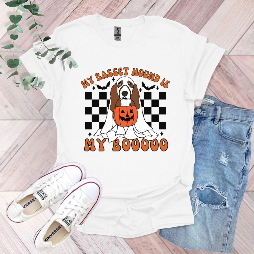 a white t - shirt with a dog wearing a jack - o'- lantern