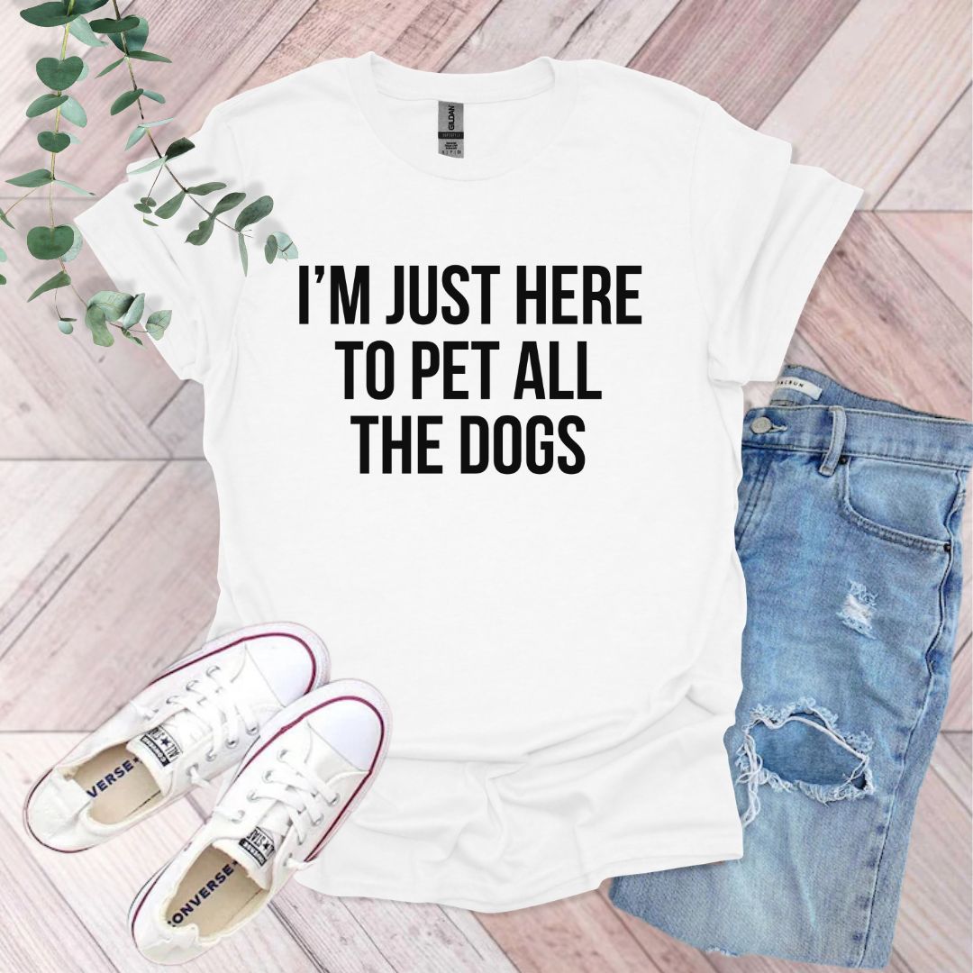 a t - shirt that says i'm just here to pet all the dogs