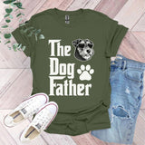 a t - shirt that says the dog father with a dog's paw on