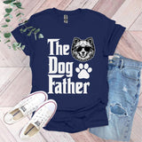 a t - shirt that says the dog father with a raccoon's