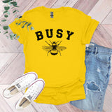 a yellow tshirt that says busy with a bee on it