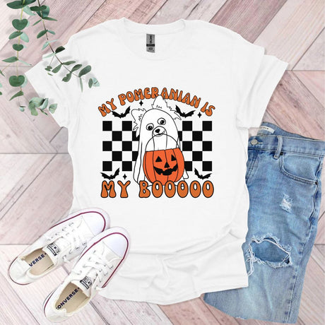 a white shirt with a pumpkin on it