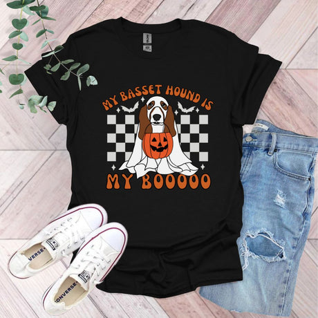 a black shirt with a brown and white dog on it