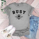 a t - shirt that says busy with a bee on it