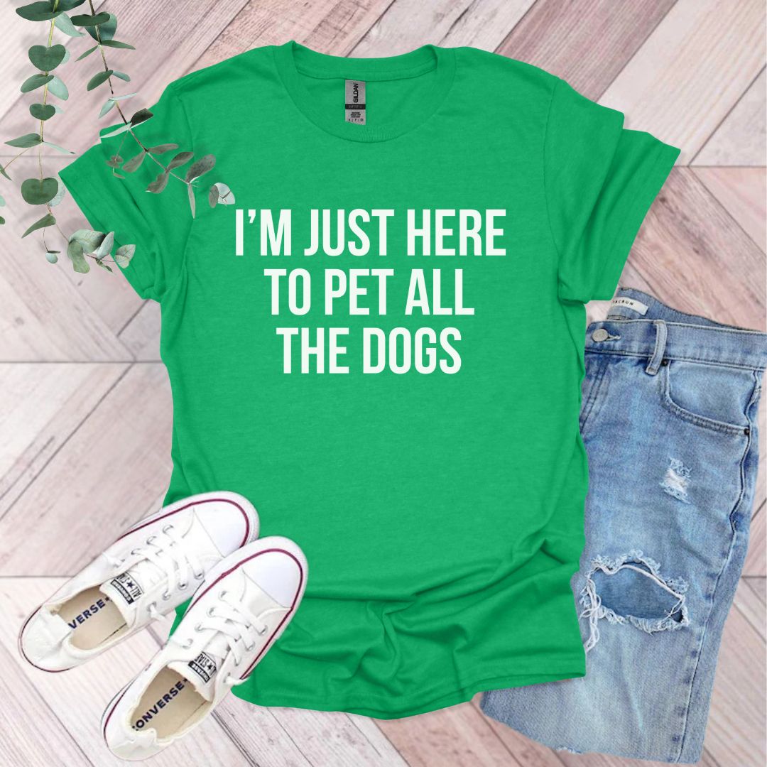 a t - shirt that says i'm just here to pet all the dogs