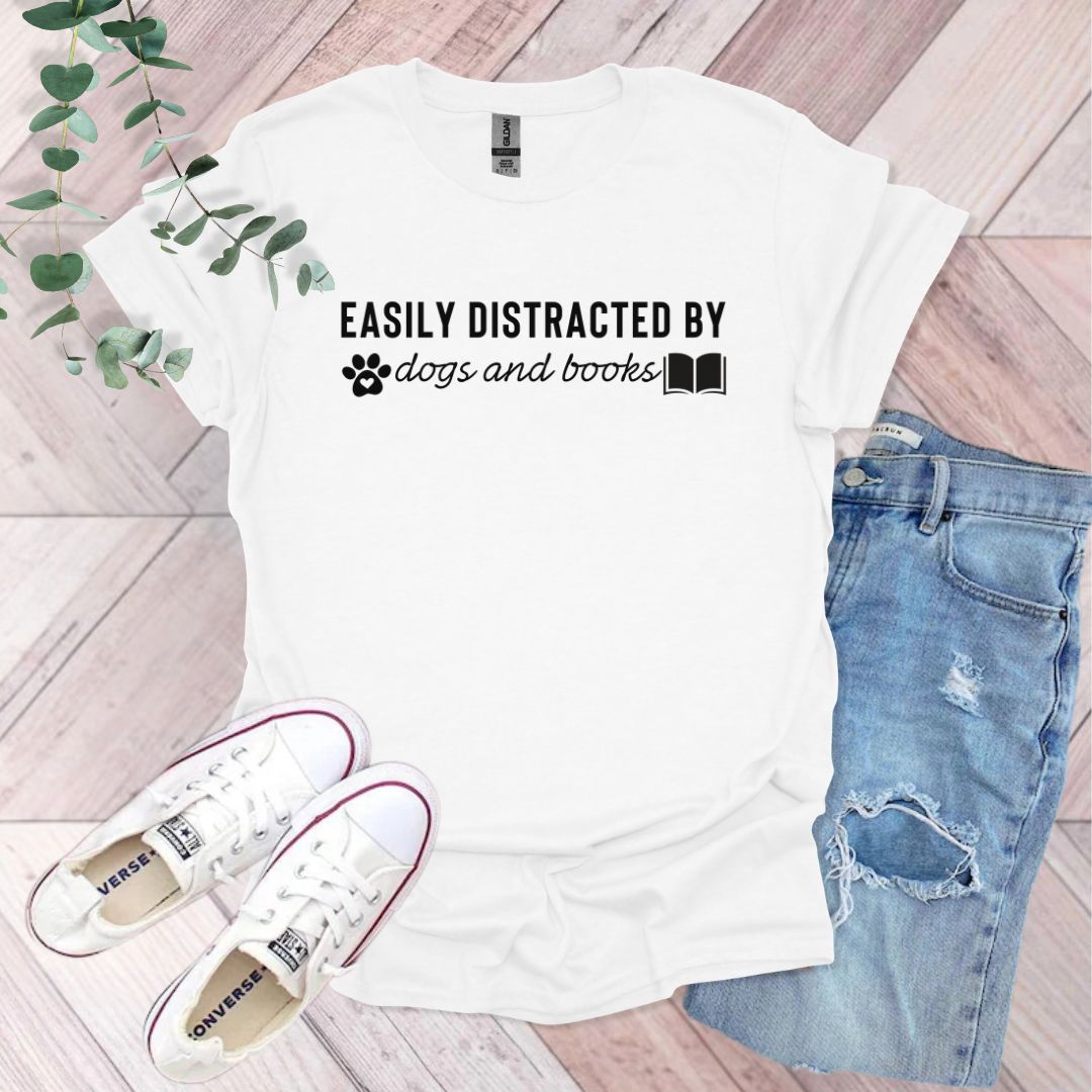 a t - shirt that says easily distracted by dogs and books